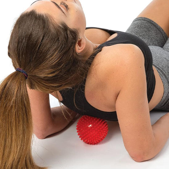 balle de massage à picots pour soulager les tensions du dos