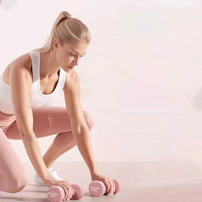 haltère en fonte rose pour musculation