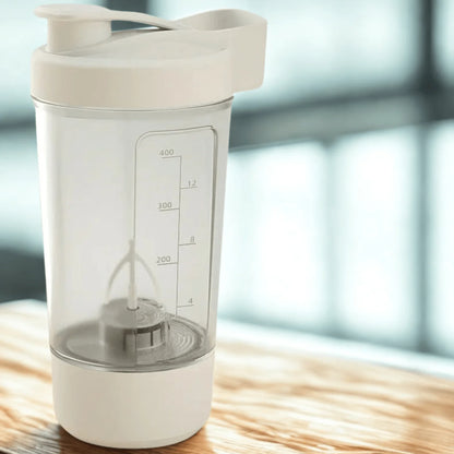Shaker électrique blanc avec échelle graduée et lames acier inoxydable